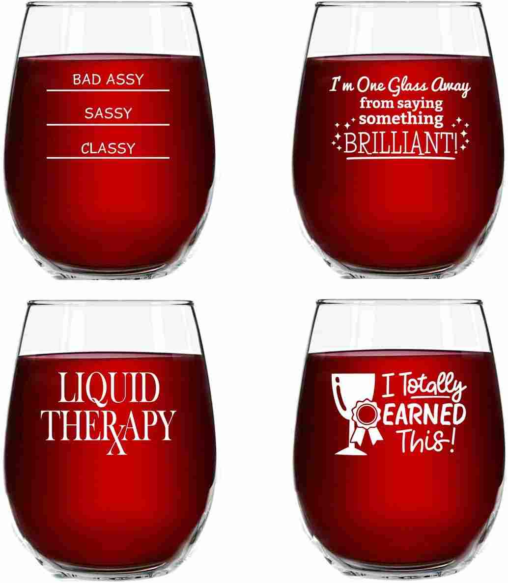 4 stemless, chip resistant wine glasses with funny quotes printed on them in white